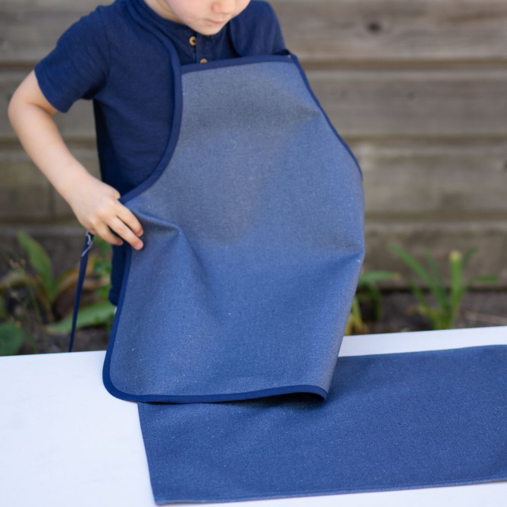 Le Duo : tablier + tapis d'activité